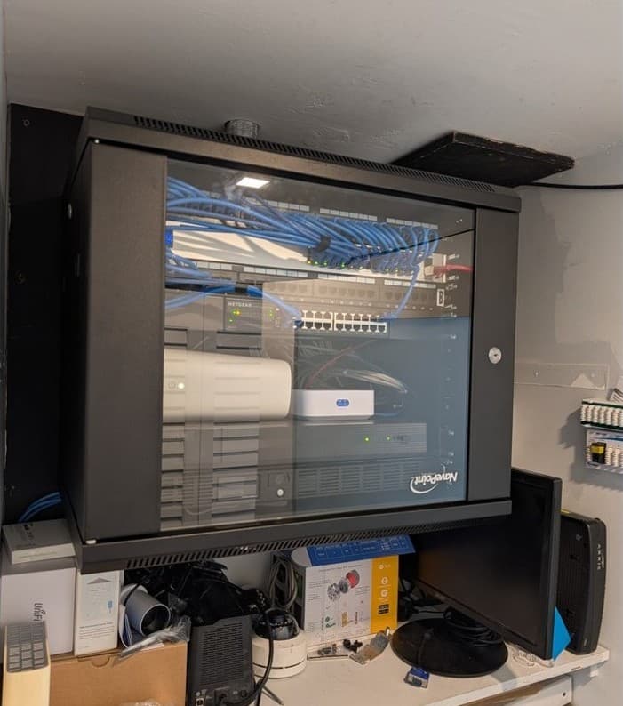 After — organized NavePoint rack cabinet with clean cable management